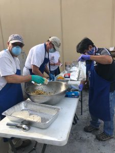 Knights prepare breakfast tacos for EMTs