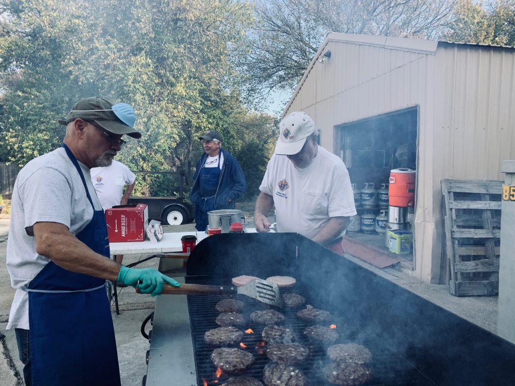 David Ybarra grilling burgers
